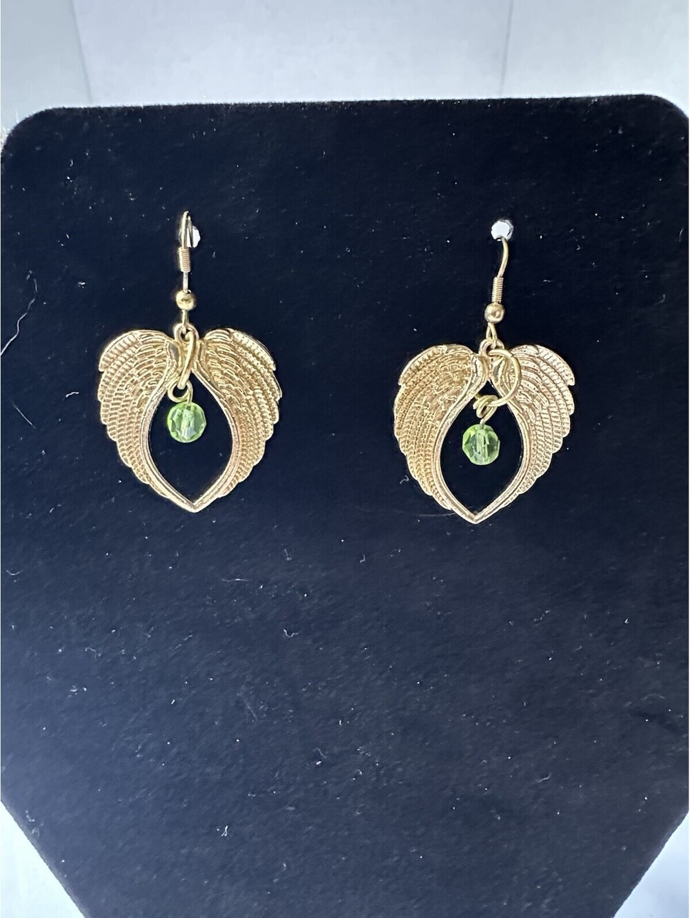 Gold Tone Lightweight Angel Wing Earrings With Green Drop Bead